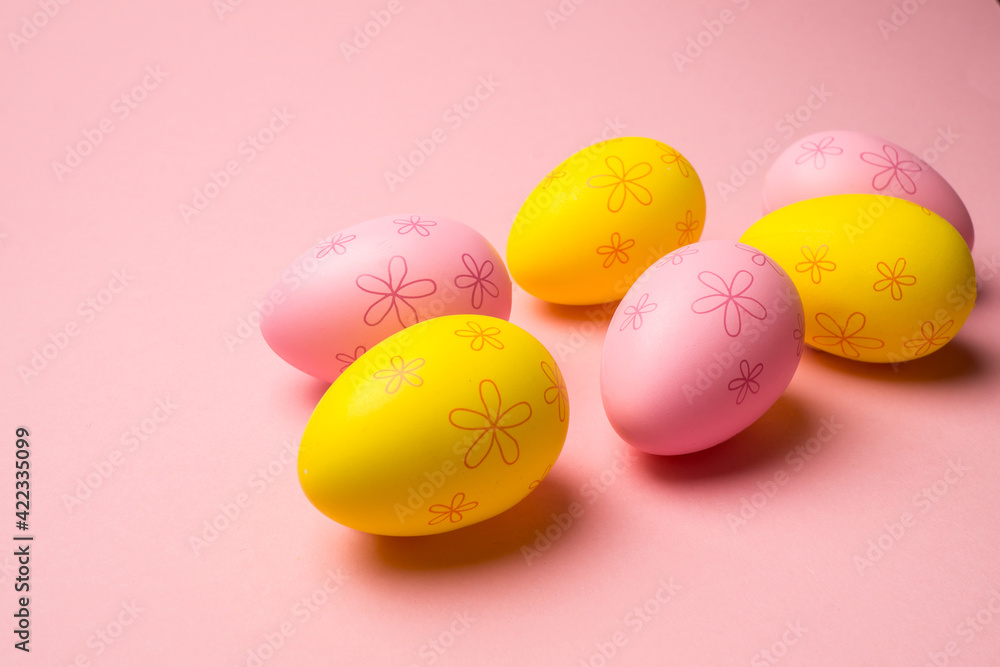  Easter eggs in the nest on light pink background. Promotion and shopping template for Easter