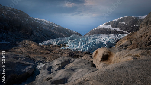Jostedalsbreen National Park near village of Gaupne in the Jostedalen valley, Norway, Europe.Natural landscape with Nigardsbreen glacier on a spring evening