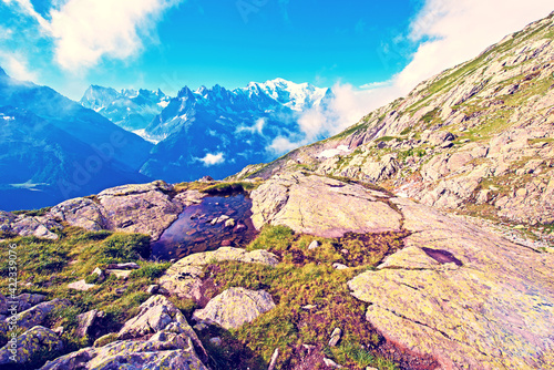 Obraz na płótnie Beautiful mountain landscape with stones in water in French Alps, massif La Blanc. (Harmony, tourism, meditation - concept) w salonie