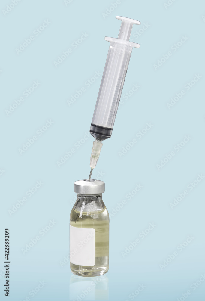 syringe and bottle of vaccine medical drug on background include path syringe and bottle of vaccine medical drug on background include path