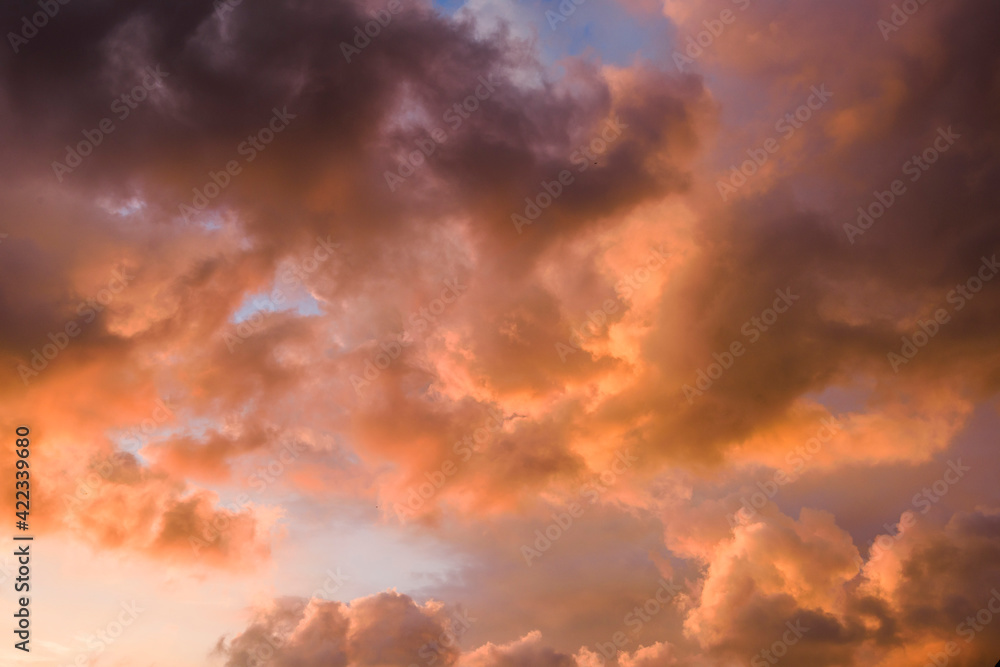 Fototapeta premium Colorful beautiful sunset with the orange cloud background