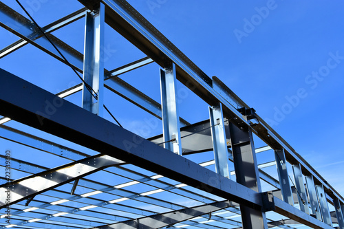 Low angle view of steel framing members for new commercial building.