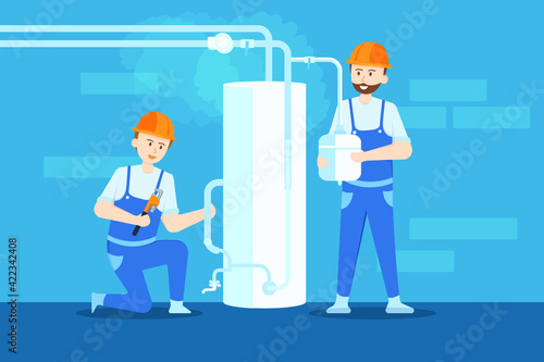 Plumber are adjusting the temperature of the boiler.