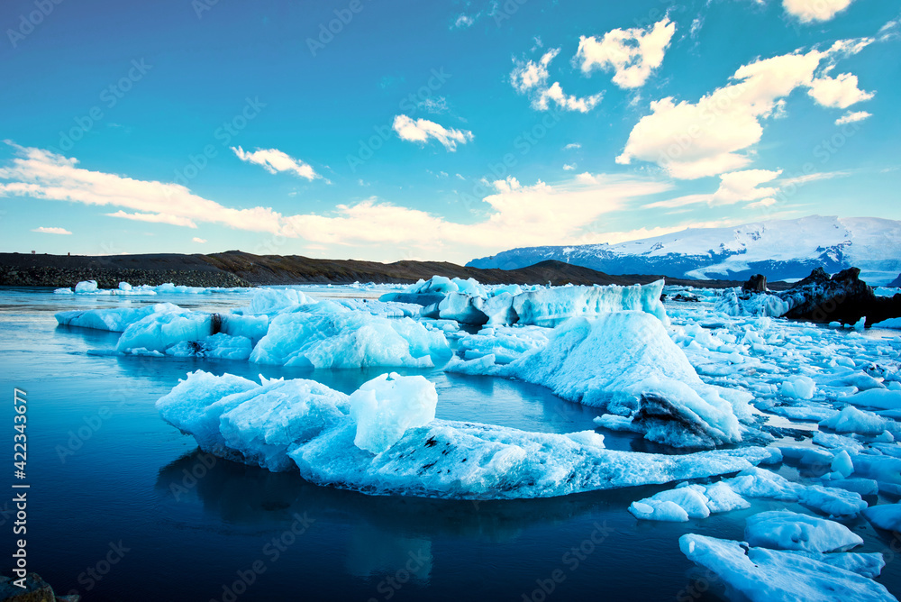 Magical beautiful landscape with ice depths in the famous Jokulsarlon glacial lagoon in Iceland. Exotic countries. Amazing places. Popular tourist atraction. (global warming – concept)