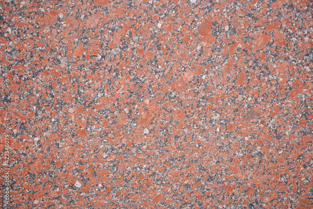 Marbled pattern of a smooth gray stone slab, natural stone cut and polished Marbled pattern of a smooth gray stone slab, natural stone cut and polished