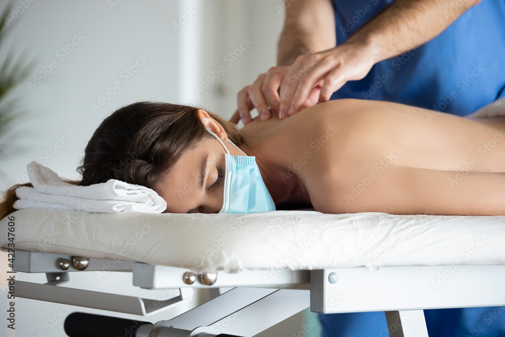 SPA and health. Manual back massage. A man on a massage couch