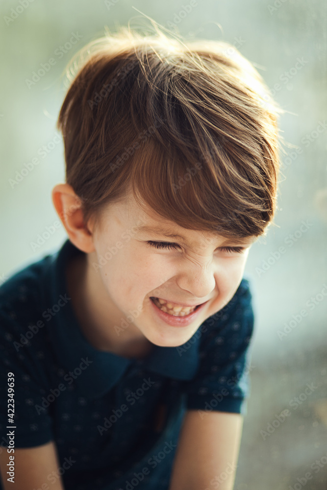 Portrait of the laughing boy. Toddler, close up portrait Portrait of the laughing boy. Toddler, close up portrait