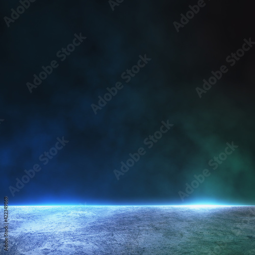 Abstract background with dark wall with copyspace and foggy concrete floor illuminated by blue color. Mock up