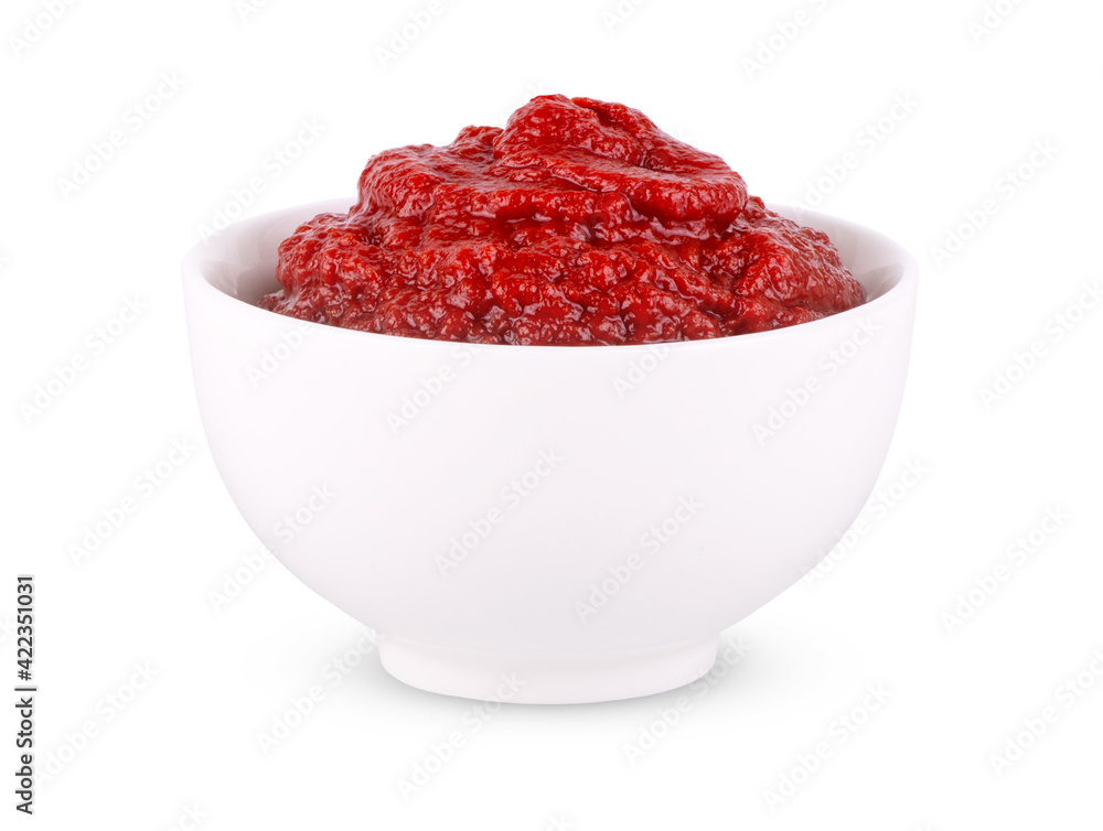 White bowl of tomato sauce or ketchup isolated on a white background