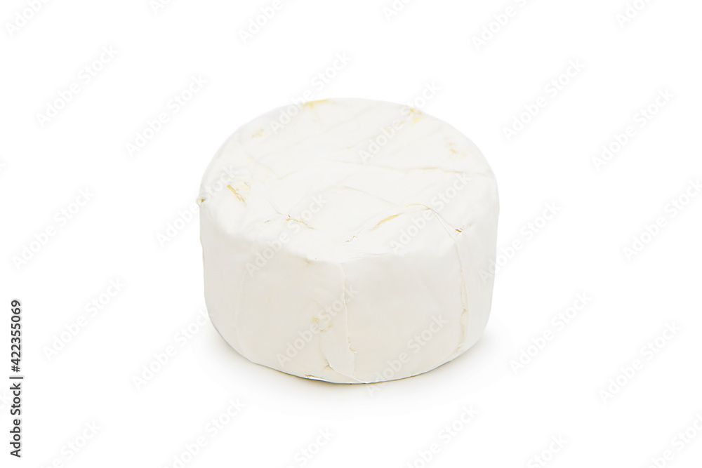 Whole head of delicious brie cheese isolated on white background. Cheese with white mold.