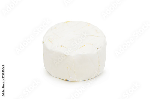 Whole head of delicious brie cheese isolated on white background. Cheese with white mold.