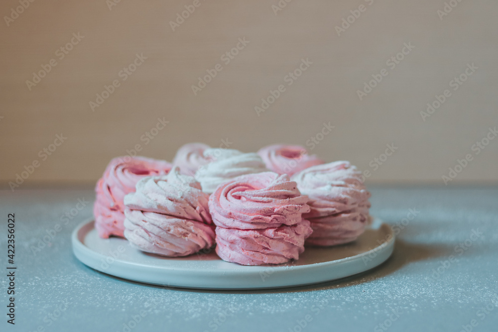 Colorful zephyr sweets on neutral background Colorful zephyr sweets on neutral background