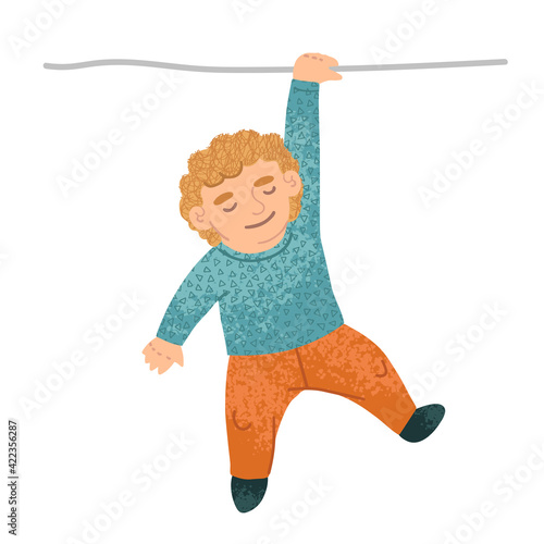 Cute little boy hanging on one hand