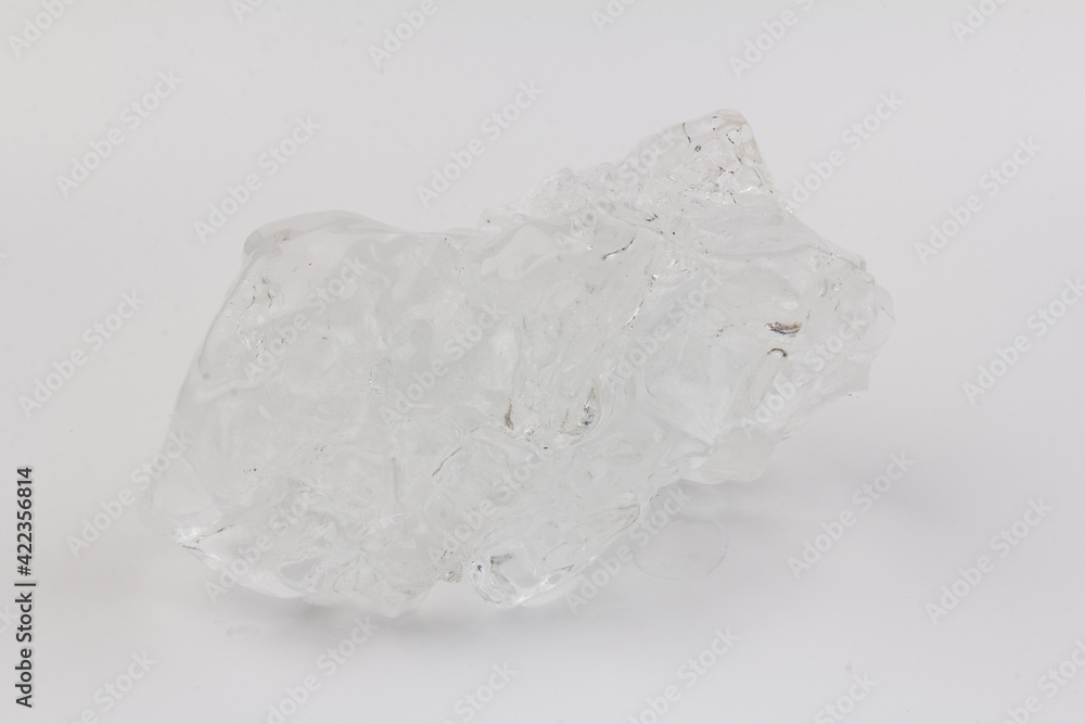 Real beautiful ice floe on light background. Cold winter ice texture. Real beautiful ice floe on light background. Cold winter ice texture.