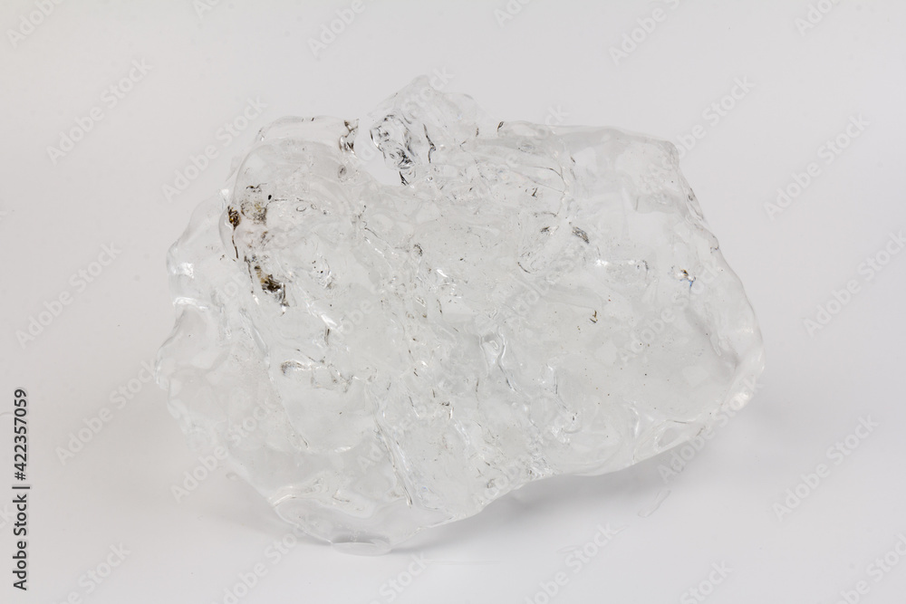 Real beautiful ice floe on light background. Cold winter ice texture. Real beautiful ice floe on light background. Cold winter ice texture.