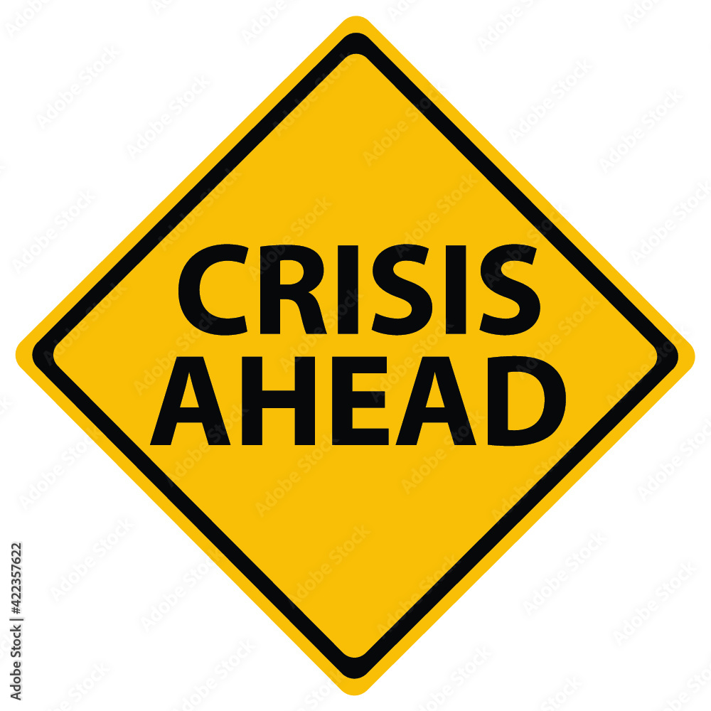 Crisis ahead on road sign isolated on white Crisis ahead on road sign isolated on white