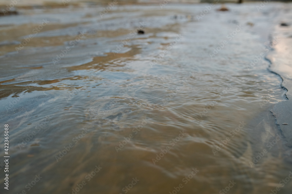 Part of dirty river with polluted water flowing somewhere in distant and abandoned area where no life is possible because of toxicity Part of dirty river with polluted water flowing somewhere in distant and abandoned area where no life is possible because of toxicity
