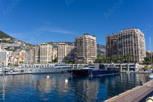 view of the harbor of Cape d'Ail and hotels in the Fontvielle District of Monaco © makasana photo