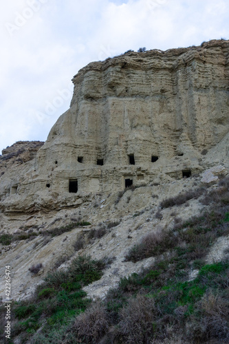 view of the caves of Arguedas and the homes in the sandstone cliffs