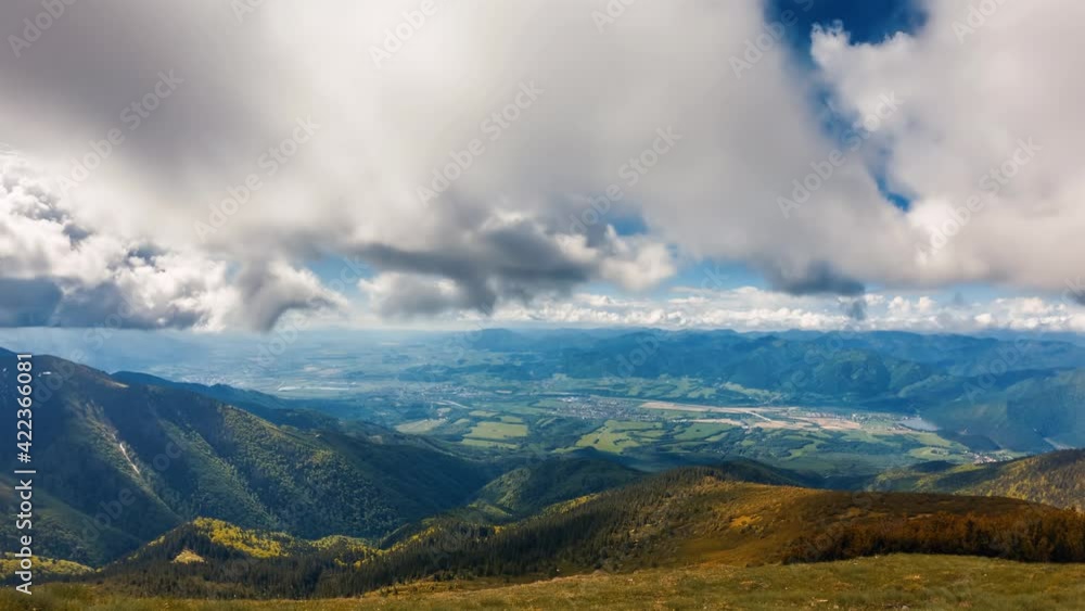 Clouds motion fast in fresh spring mountains nature landscape in sunny time lapse Clouds motion fast in fresh spring mountains nature landscape in sunny time lapse