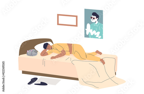 Man sleeping in bed all day during lazy weekend. Tired guy lying in bedroom resting
