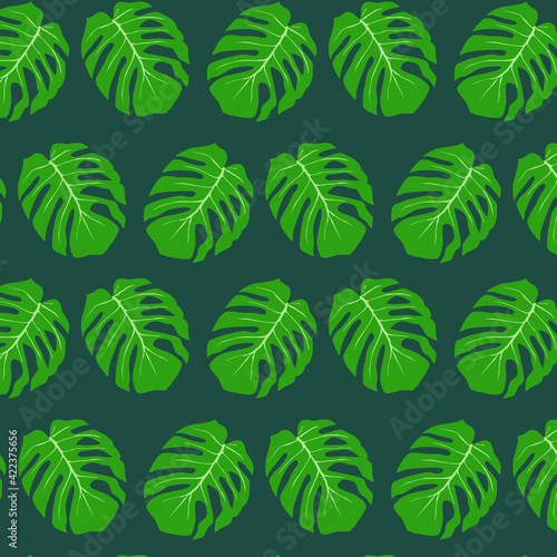 Tropical leaves pattern. Seamless vector pattern with with green monstera leaf on Tidewater Green background 