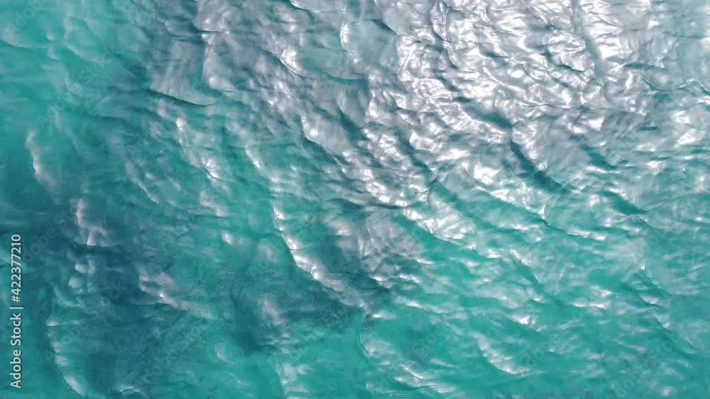 Video shot of sea water and gentle waves in top view, overview, Turkish Aegais coast. Dream beach Video shot of sea water and gentle waves in top view, overview, Turkish Aegais coast. Dream beach
