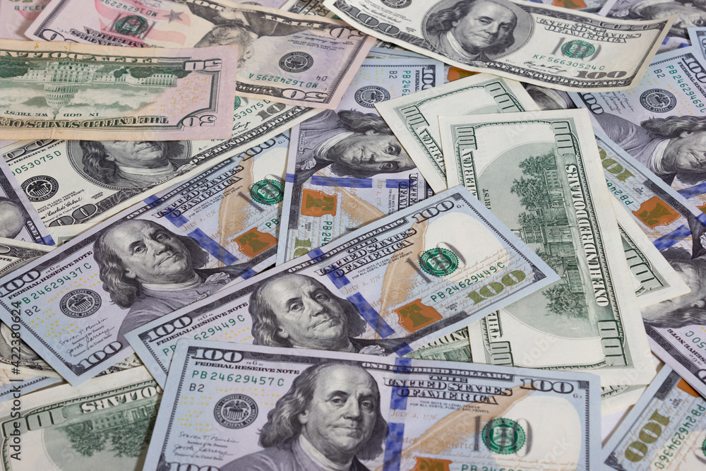 Bundle of dollars on the table close-up - texture, background Bundle of dollars on the table close-up - texture, background