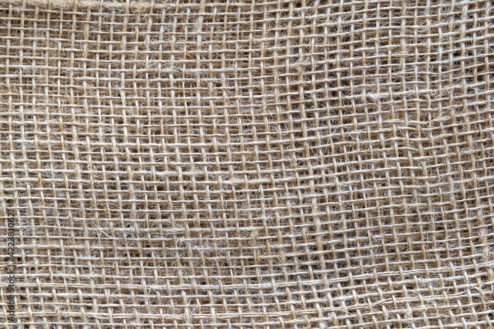 Coarse thread burlap texture. Background. Coarse thread burlap texture. Background.