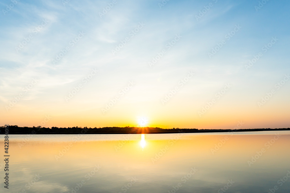 Sunset in the lake, beautiful sunset above the sea landscape background Sunset in the lake, beautiful sunset above the sea landscape background