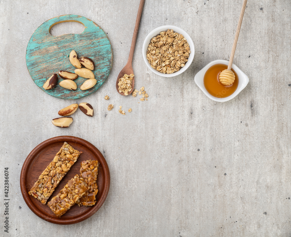 Homemade cereal bars with nuts, muesli, honey and copy space Homemade cereal bars with nuts, muesli, honey and copy space