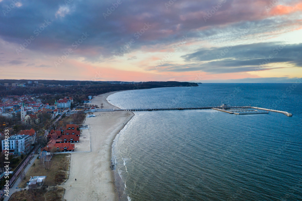 Amazing sunset at the beach of Baltic Sea in Sopot, Poland