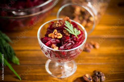 dietary salad of boiled beets with walnuts