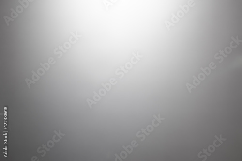 Gray metal background, gradient from white to black photo