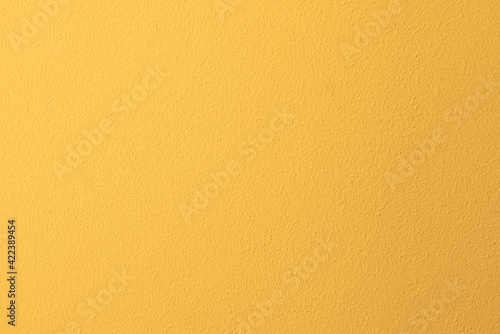 Textura de pared pintada de amarillo