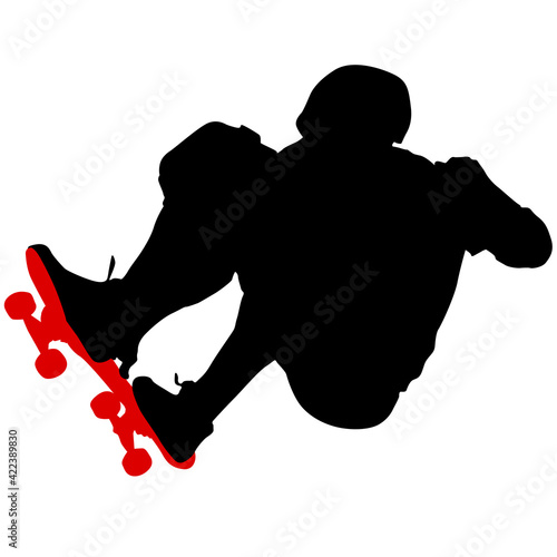 Black silhouette of an athlete skateboarder in a jump