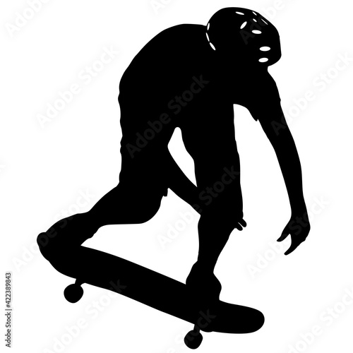 Black silhouette of an athlete skateboarder in a jump