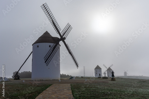 the windmills and metal statues in Mota del Cuervo in La Mancha © makasana photo