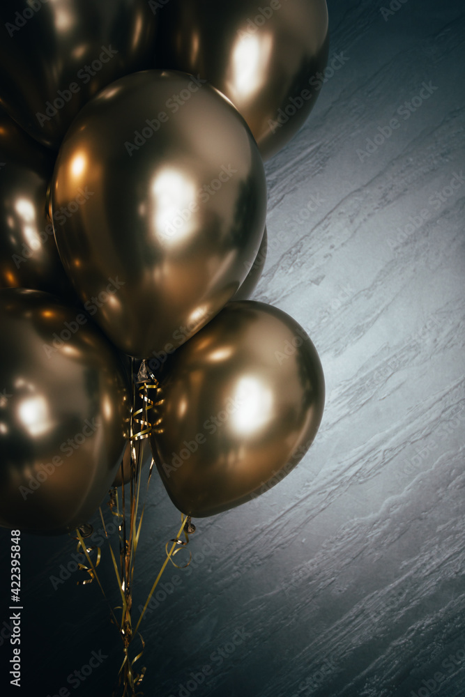 Festive and elegant background with silver wall and golden balloons. Festive and elegant background with silver wall and golden balloons.