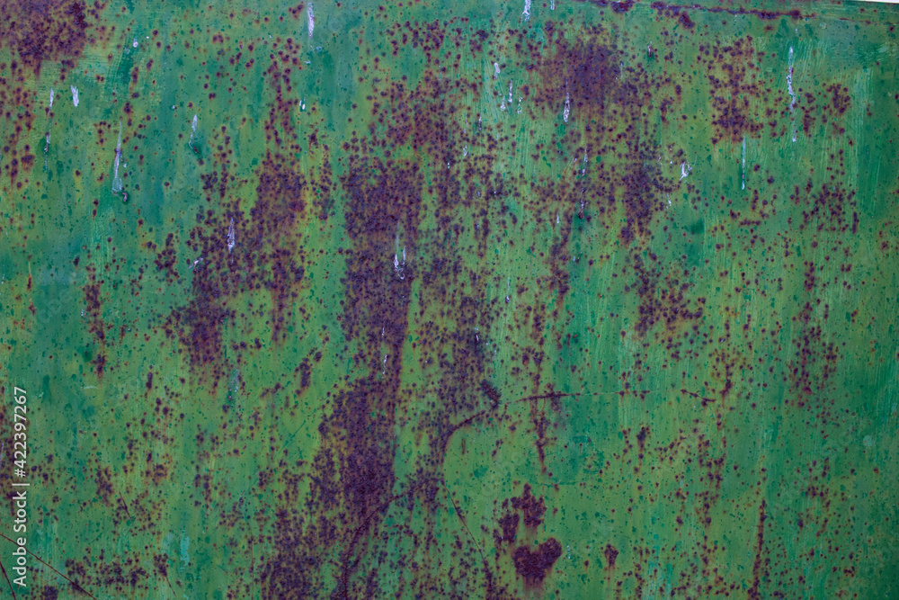 Metal of a metal door, weathered in southern Spain Metal of a metal door, weathered in southern Spain