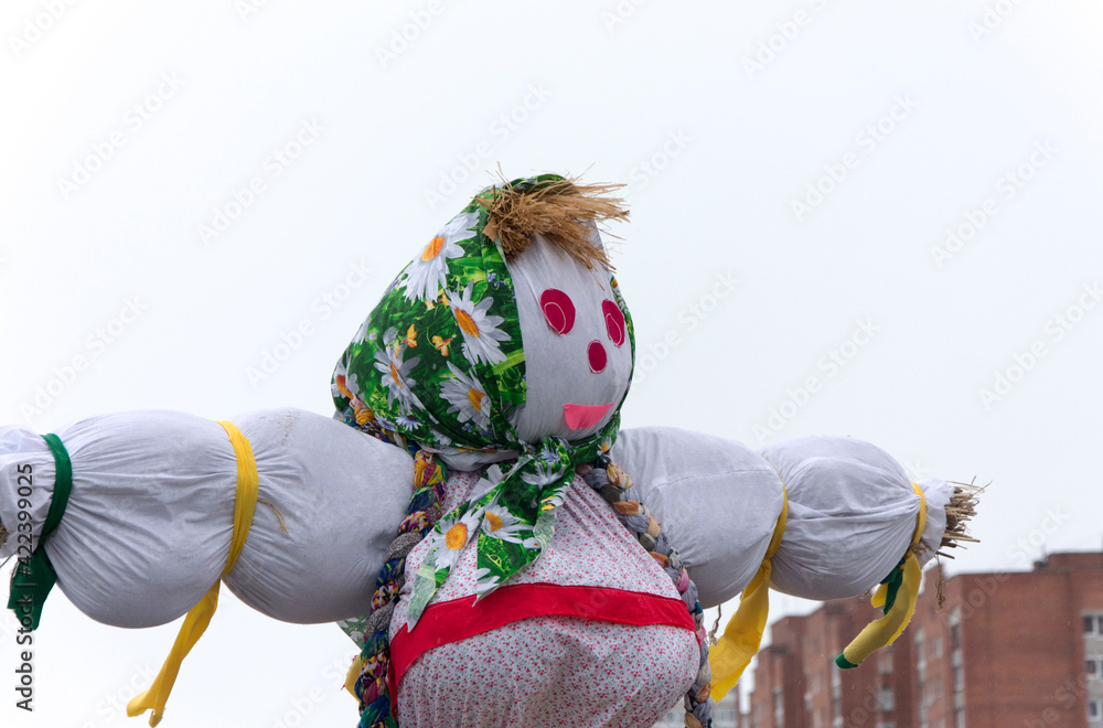 traditional doll in national clothes for burning on the Russian holiday Maslenitsa, the onset of spring, folk festivals