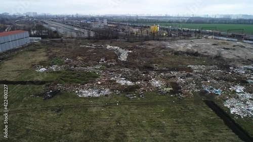 Illegal garbage dump near the railway drone view