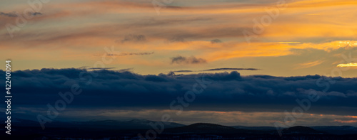 Orange glowing clouds at sunset. Shot in Sweden, Scandinavia