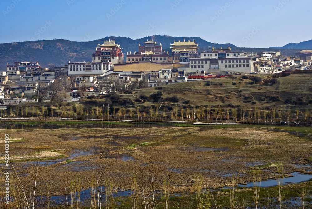 Songzanlin Tibetan Buddhist monastery sits on a hill above Lamuyangcuo Lake, Shangri-la, Yunnan Province, China