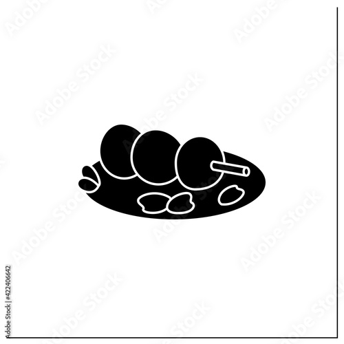 Sanshoku dango glyph icon. Rice balls or dumplings on stick.Traditional dish.Spring Japanese food concept. Filled flat sign. Isolated silhouette vector illustration