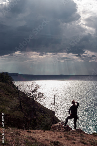 Woman looking at scenic view of Lake Baikal