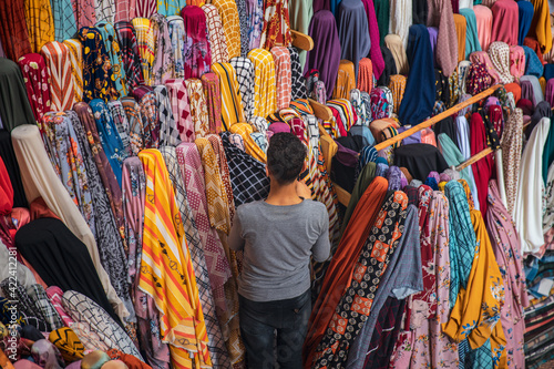 Colorful market stalls with scaves in Cairo Bazar