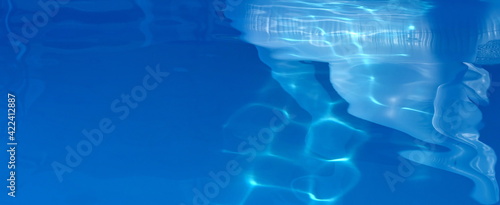 Abstract water reflection. Water abstract background, Swimming pool rippled. Surface of blue swimming pool,background of water in swimming pool. Water background blue. 