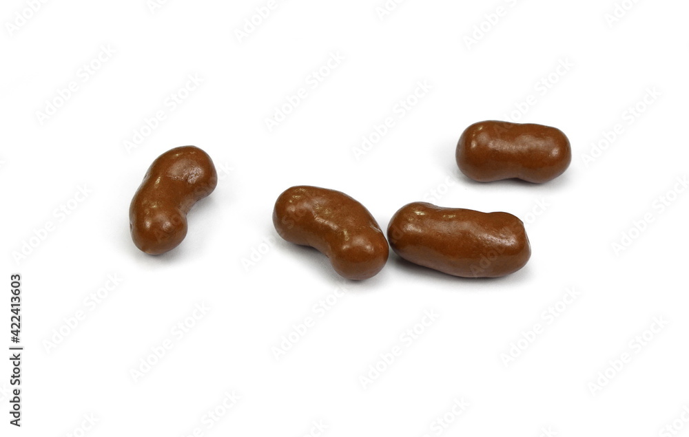 Chocolate, sweet crunchy snack isolated on white background. Chocolate balls on white background. chocolate covered corn flips. Chocolate, sweet crunchy snack isolated on white background. Chocolate balls on white background. chocolate covered corn flips.