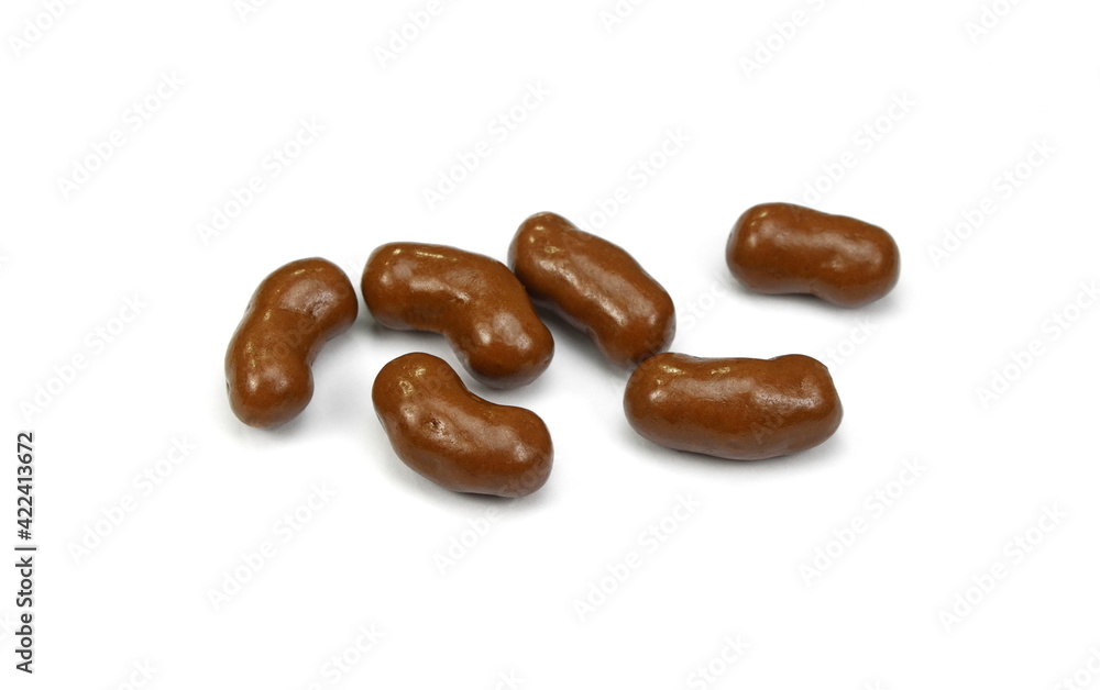 Chocolate, sweet crunchy snack isolated on white background. Chocolate balls on white background. chocolate covered corn flips. Chocolate, sweet crunchy snack isolated on white background. Chocolate balls on white background. chocolate covered corn flips.